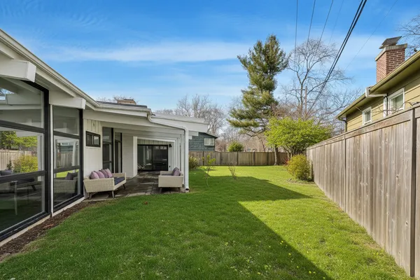 a view of a backyard with a garden