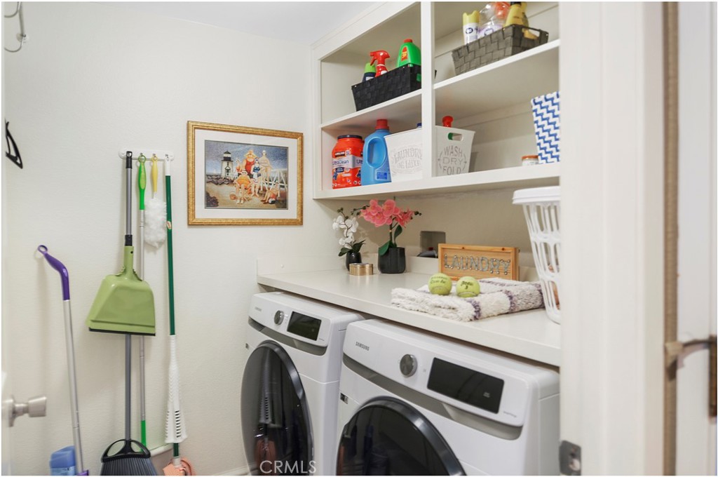 33766 Captains Lane, Unit 200 Dana Point, CA 92629 - Photo 11 of 38 a utility room with dryer and washer