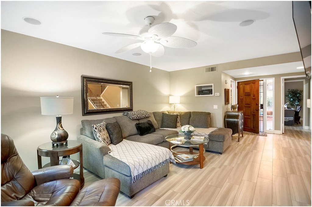 33766 Captains Lane, Unit 200 Dana Point, CA 92629 - Photo 14 of 38 a living room with furniture and a wooden floor