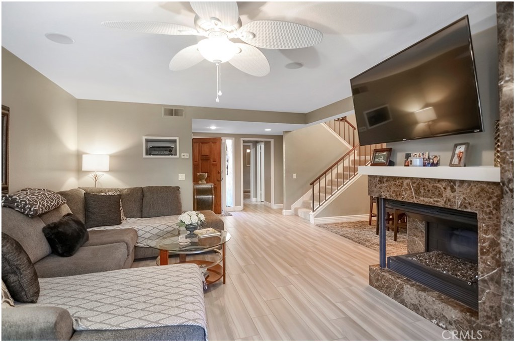 33766 Captains Lane, Unit 200 Dana Point, CA 92629 - Photo 15 of 38 a living room with furniture and a flat screen tv