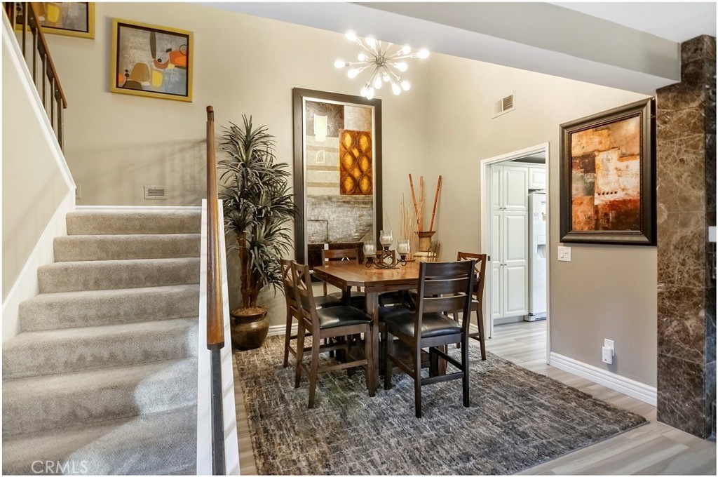 33766 Captains Lane, Unit 200 Dana Point, CA 92629 - Photo 16 of 38 a view of a dining room with furniture
