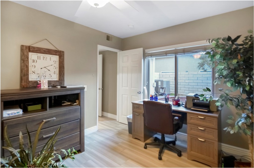33766 Captains Lane, Unit 200 Dana Point, CA 92629 - Photo 18 of 38 a view of a workspace with furniture and a window