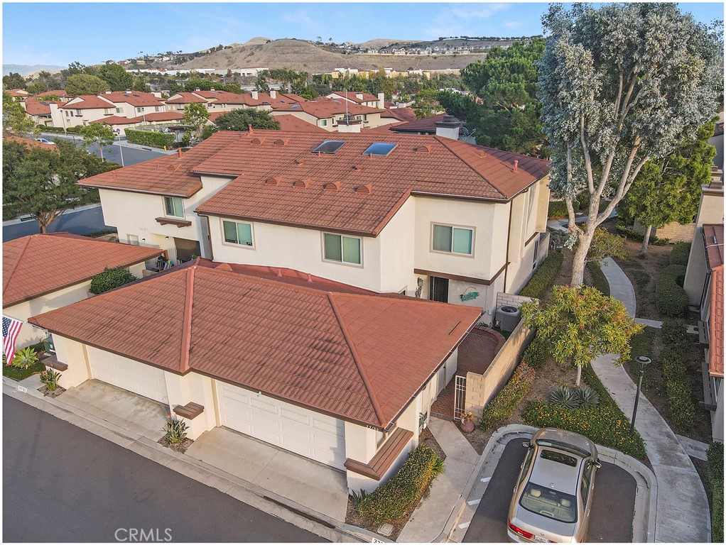 33766 Captains Lane, Unit 200 Dana Point, CA 92629 - Photo 5 of 38 an aerial view of a house with a garden