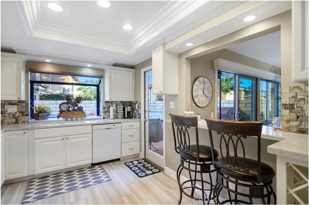 33766 Captains Lane, Unit 200 Dana Point, CA 92629 - Photo 7 of 38 a very nice looking dining room with a large window and stainless steel appliances