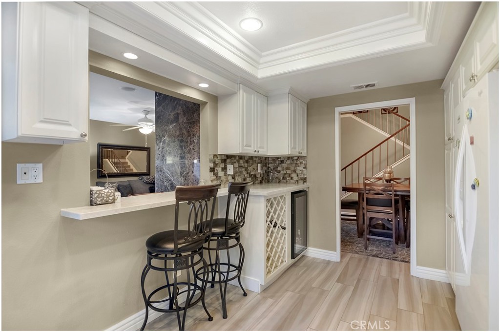 33766 Captains Lane, Unit 200 Dana Point, CA 92629 - Photo 8 of 38 a view of kitchen with furniture and wooden floor