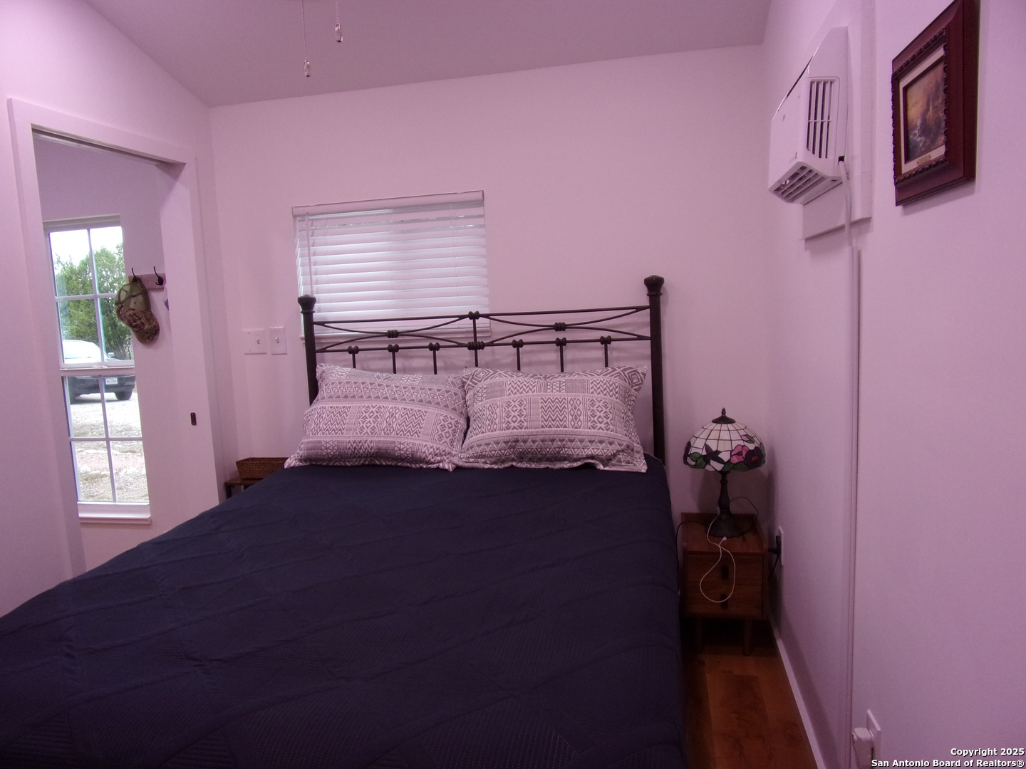 2471 Rolling River Spring Branch, TX 78070 - Photo 13 of 24 a bed room with a bed and a window