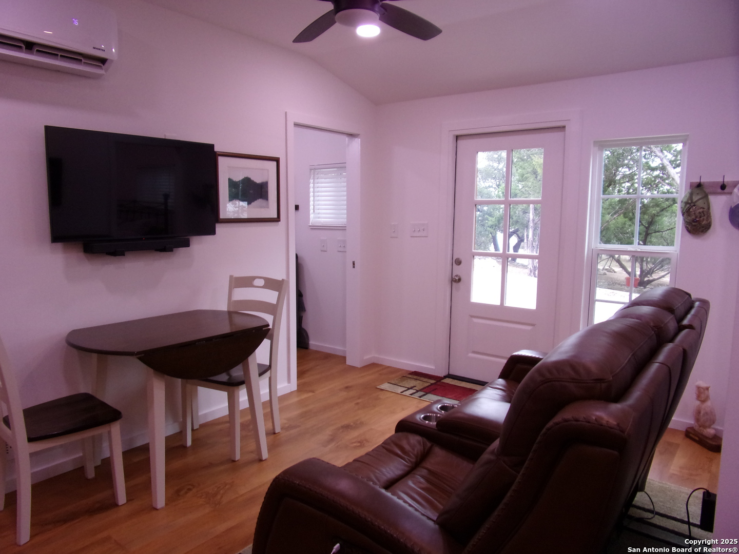 2471 Rolling River Spring Branch, TX 78070 - Photo 5 of 24 a living room with furniture and a flat screen tv