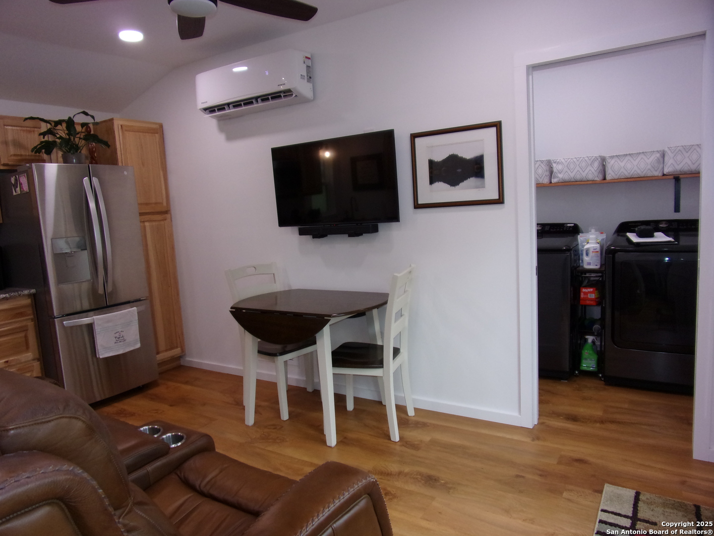 2471 Rolling River Spring Branch, TX 78070 - Photo 8 of 24 a living room with furniture and a flat screen tv