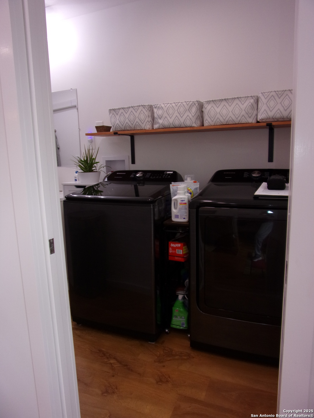 2471 Rolling River Spring Branch, TX 78070 - Photo 9 of 24 a close view of a stove a microwave and cabinets
