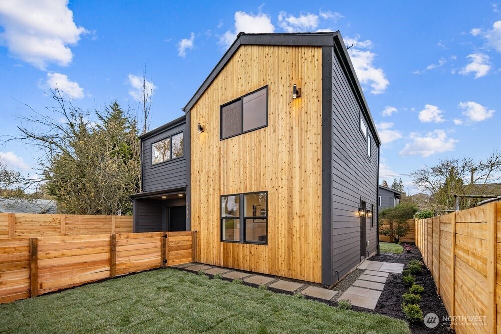 3215 22nd Avenue South Seattle, WA 98144 - Photo 25 of 28 a front view of a house with a yard