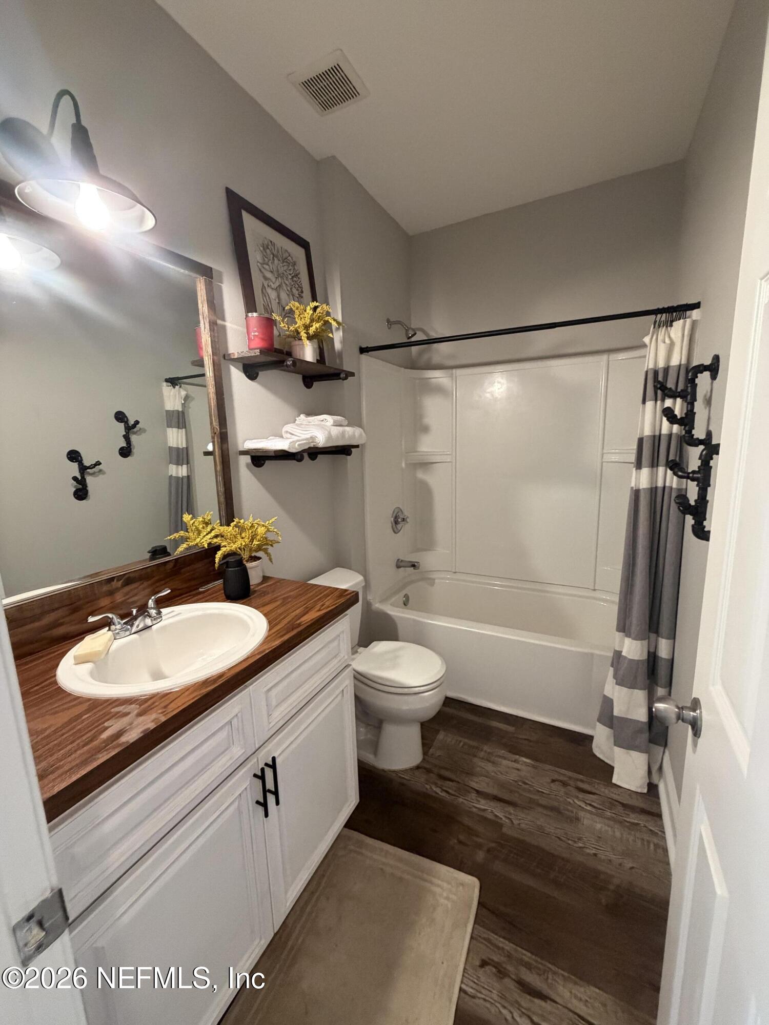 204 Comer Road Palatka, FL 32177 - Photo 8 of 15 a bathroom with a sink toilet and shower
