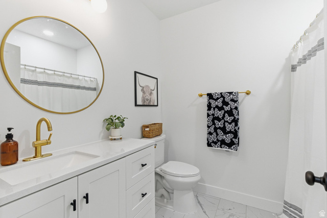 596 South Meade Street Mapleton, UT 84664 - Photo 21 of 38 Full bathroom featuring vanity, a shower with shower curtain, and light marble finish flooring