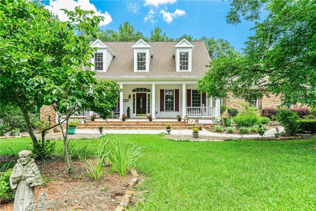 250 Friendship Church Road Brooks, GA 30205 - Photo 1 of 1 a view of a house with a yard patio and swimming pool