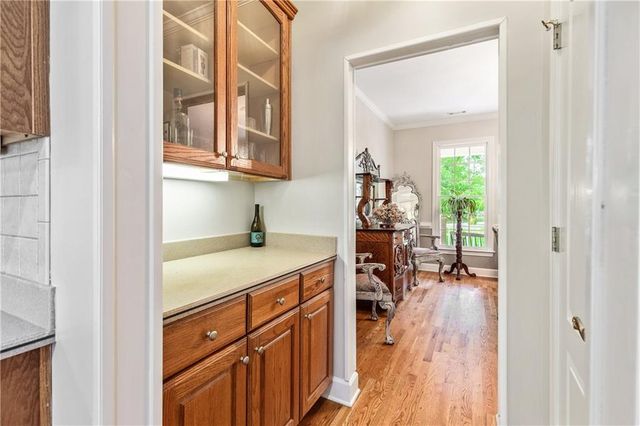 a bathroom with sink bathtub and double vanity