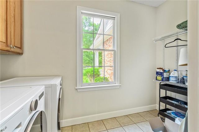 a view of a hallway with stairs