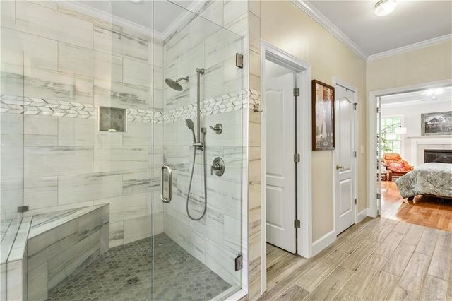 a bedroom with a bed and a window in it