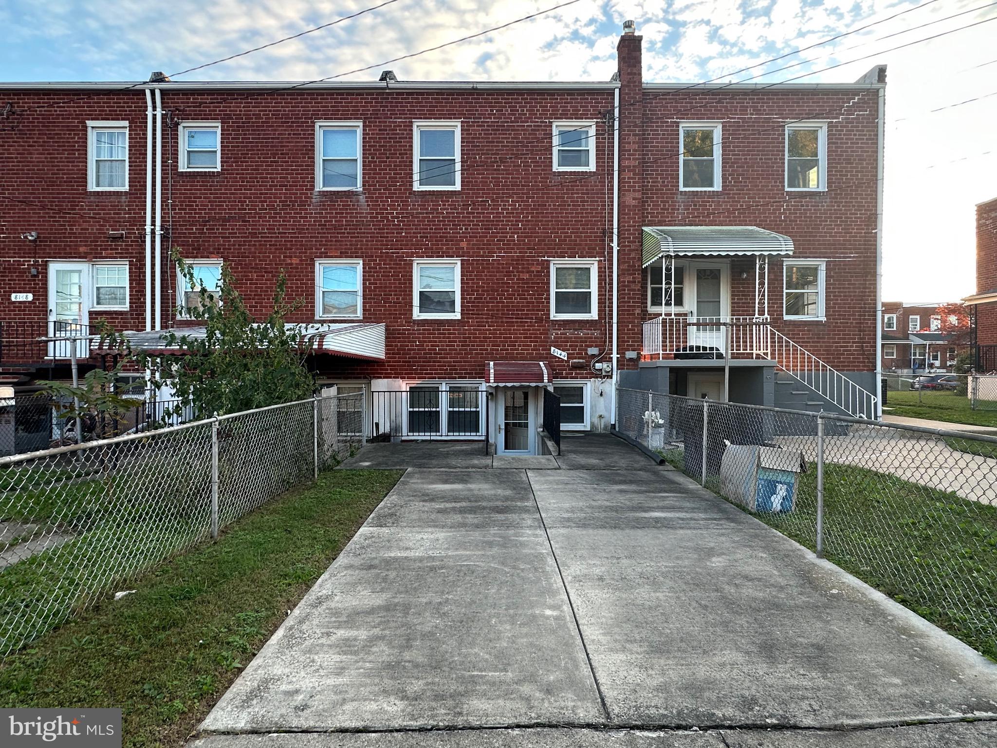 8144 Gray Haven Road Baltimore, MD 21222 - Photo 29 of 37 a front view of house with yard