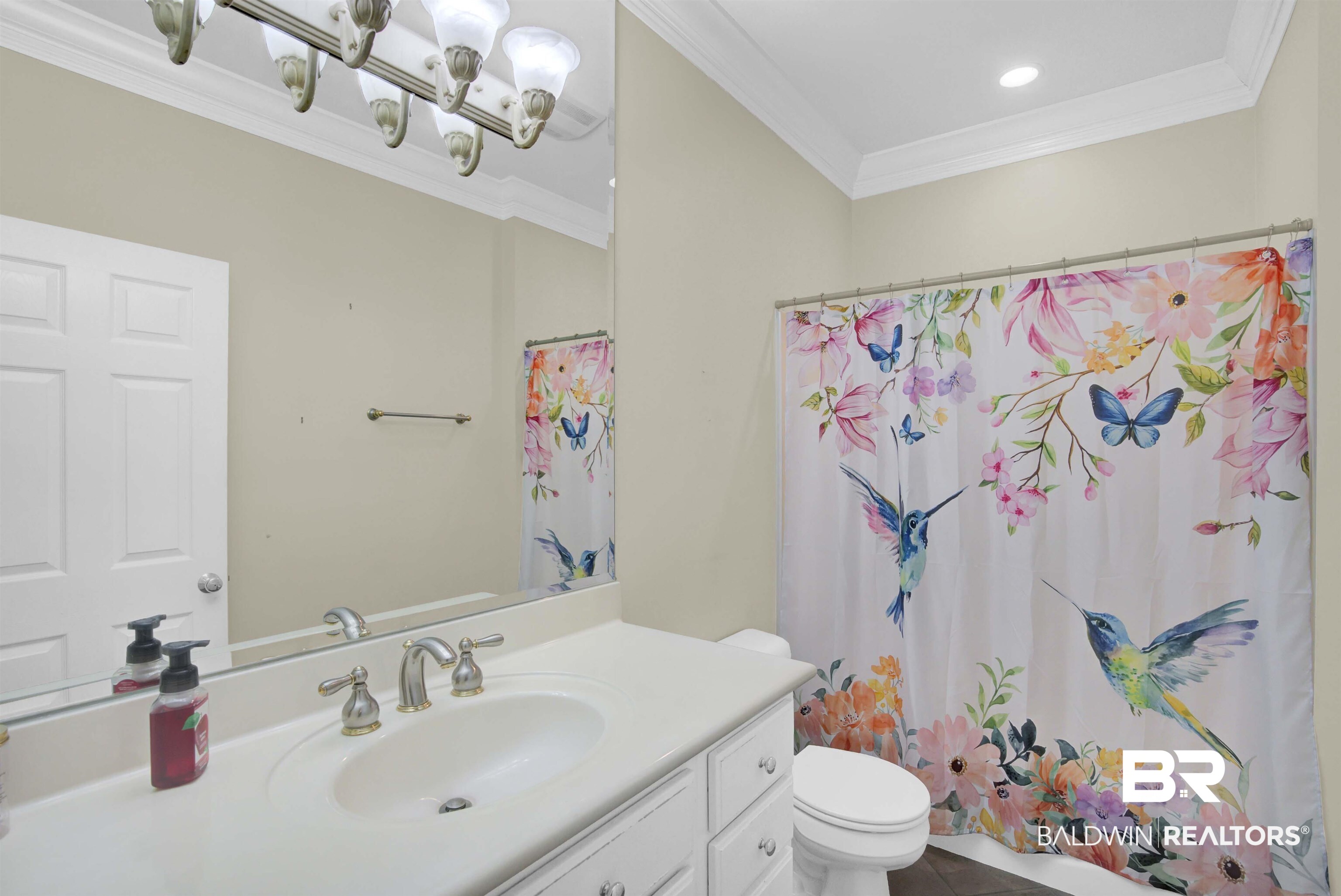 27688 Rigsby Road Daphne, AL 36526 - Photo 38 of 56 Bathroom featuring crown molding, toilet, vanity, and tile patterned flooring
