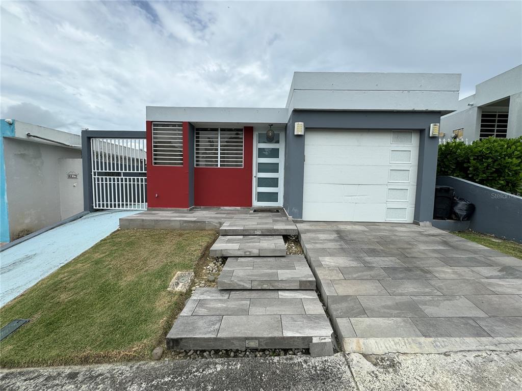 10 St Bayamon, Unit BB16 Bayamon, PR 00956 - Photo 1 of 1 front view of a house