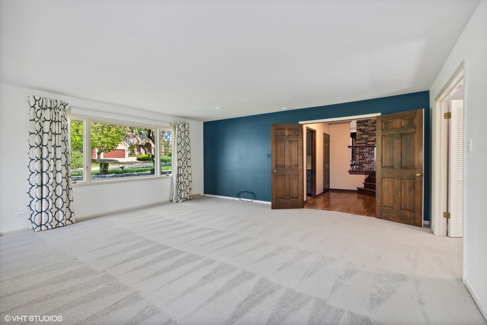 511 Aberdeen Road Frankfort, IL 60423 - Photo 21 of 48 a view of an empty room with a fireplace and a window