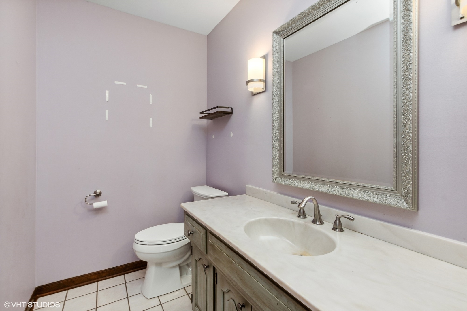 511 Aberdeen Road Frankfort, IL 60423 - Photo 33 of 48 a bathroom with a granite countertop sink a toilet and a mirror