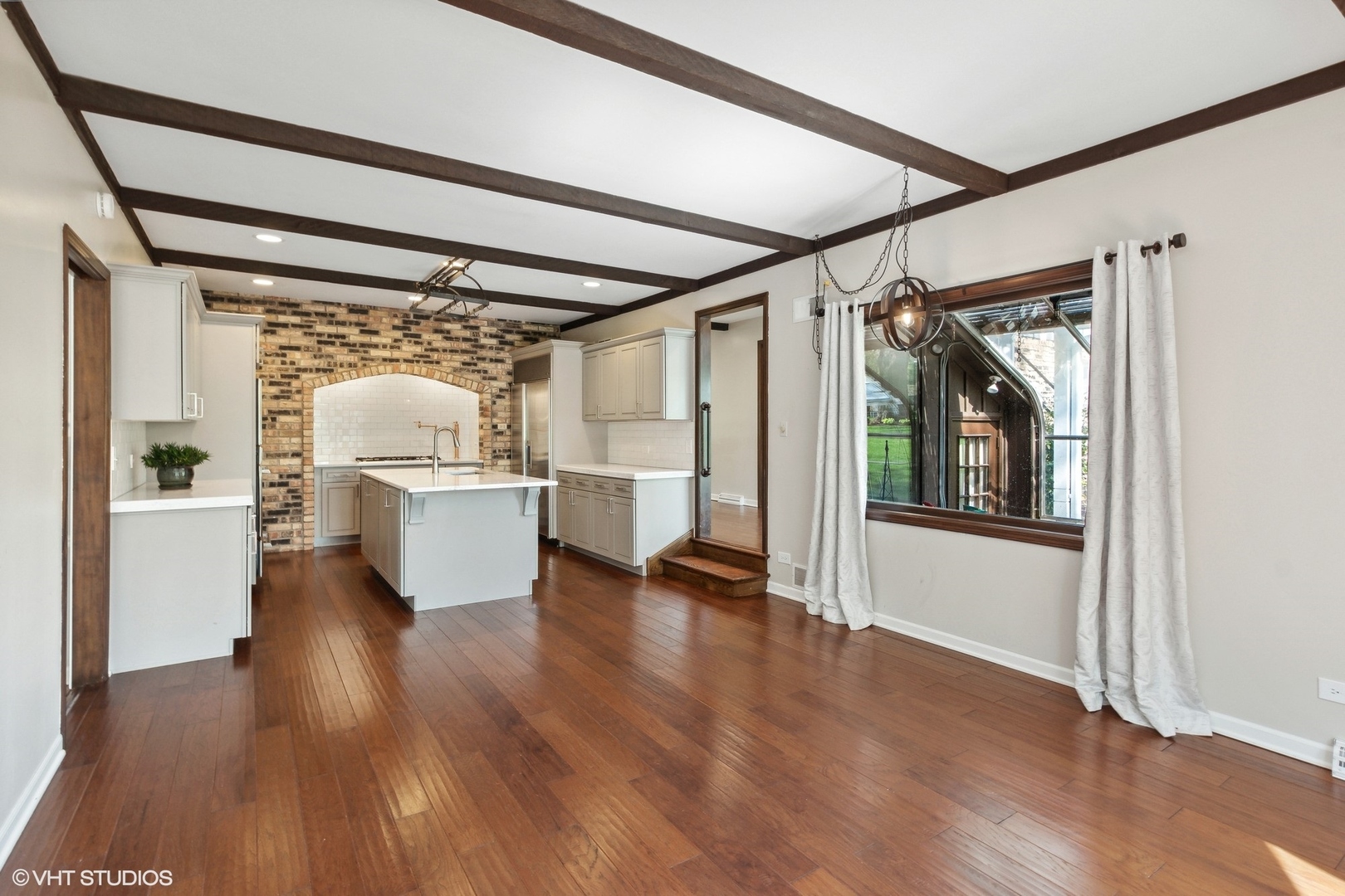 511 Aberdeen Road Frankfort, IL 60423 - Photo 9 of 48 a view of a hallway with wooden floor and windows