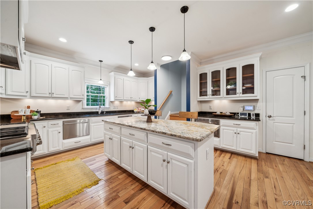 17300 Creekbed Road Chesterfield, VA 23838 - Photo 21 of 49 Closed door is pantry storage. Glass cabinets foun