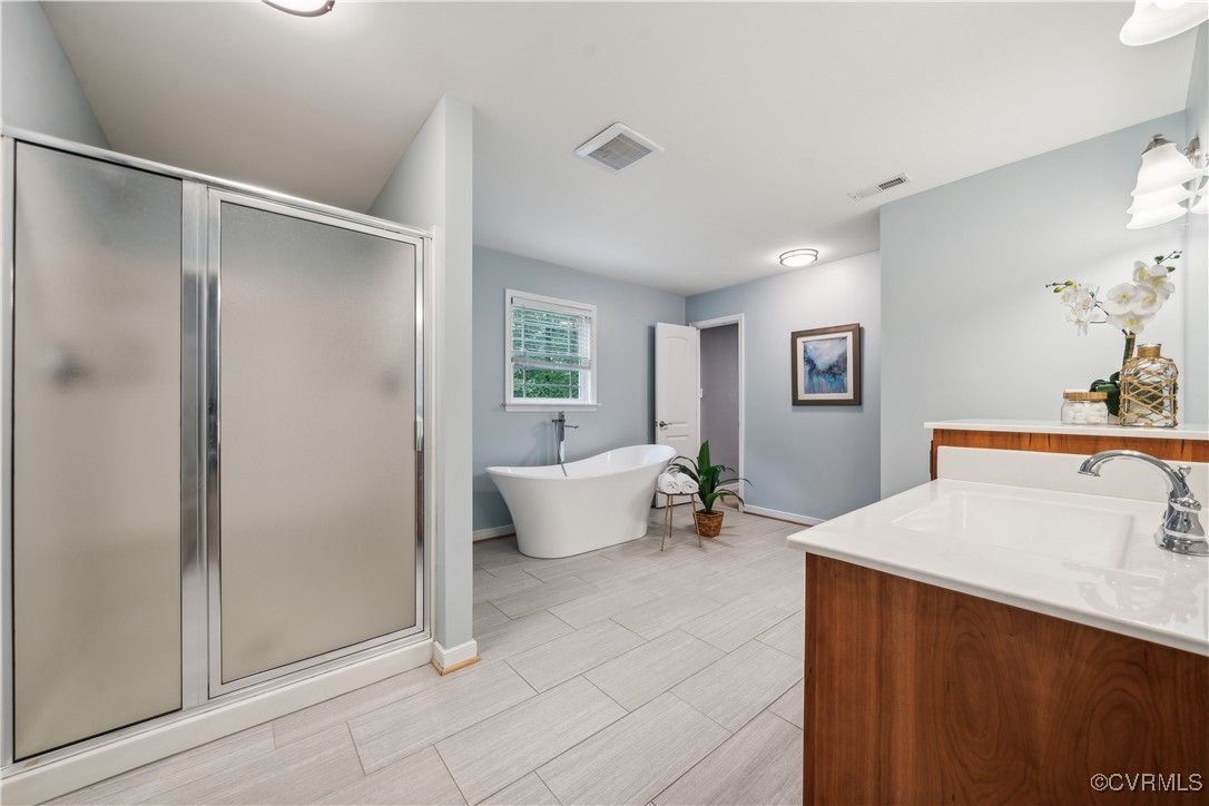 17300 Creekbed Road Chesterfield, VA 23838 - Photo 25 of 49 5 piece en-suite with beautiful tile floor, pictur