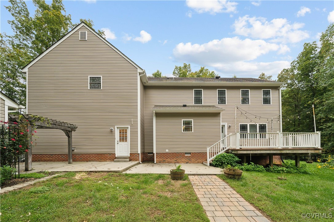 17300 Creekbed Road Chesterfield, VA 23838 - Photo 44 of 49 Rear of the home with deck, concrete patio, and wa