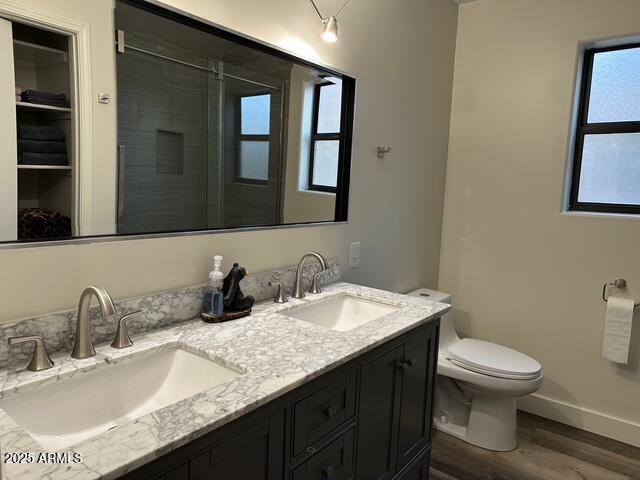 304 North Mogollon Trail Payson, AZ 85541 - Photo 18 of 22 a bathroom with a granite countertop sink a toilet and mirror