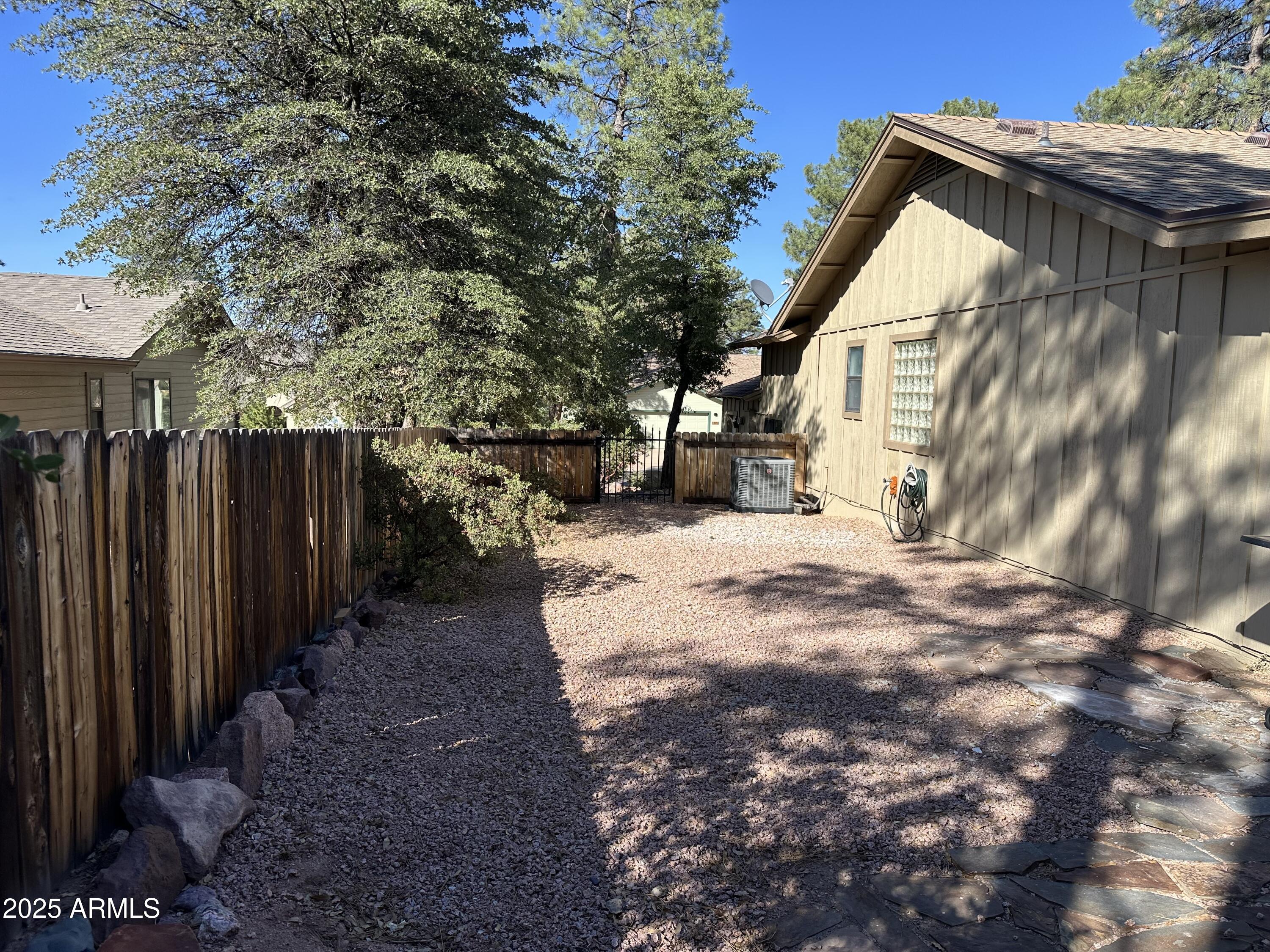 304 North Mogollon Trail Payson, AZ 85541 - Photo 22 of 22 a view of backyard of house with wooden fence