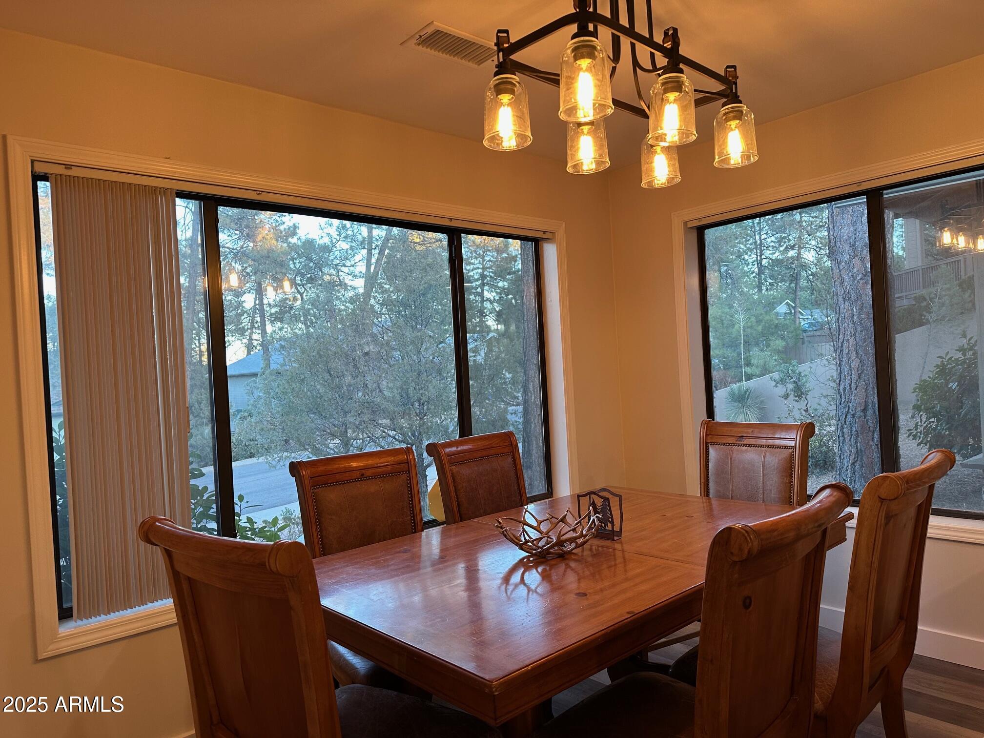 304 North Mogollon Trail Payson, AZ 85541 - Photo 7 of 22 a view of a dining room with furniture window and outside view