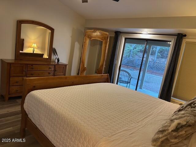 304 North Mogollon Trail Payson, AZ 85541 - Photo 10 of 22 a bedroom with a bed and a mirror on dresser