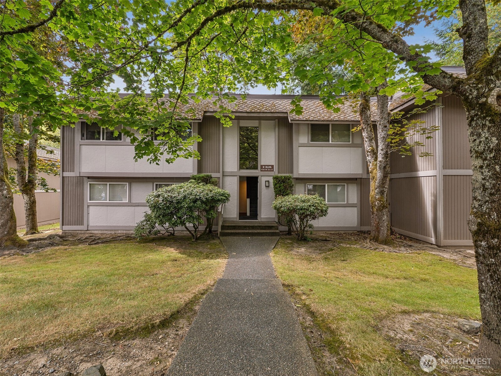 4601 Southwest 320th Street, Unit R2 Federal Way, WA 98023 - Photo 1 of 10 a view of a house with backyard and a tree