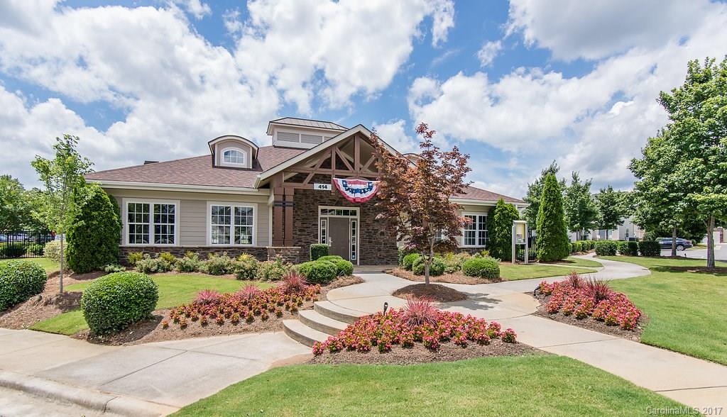 309 River Clay Road, Unit 309 Fort Mill, SC 29708 - Photo 23 of 23 a front view of a house with a garden