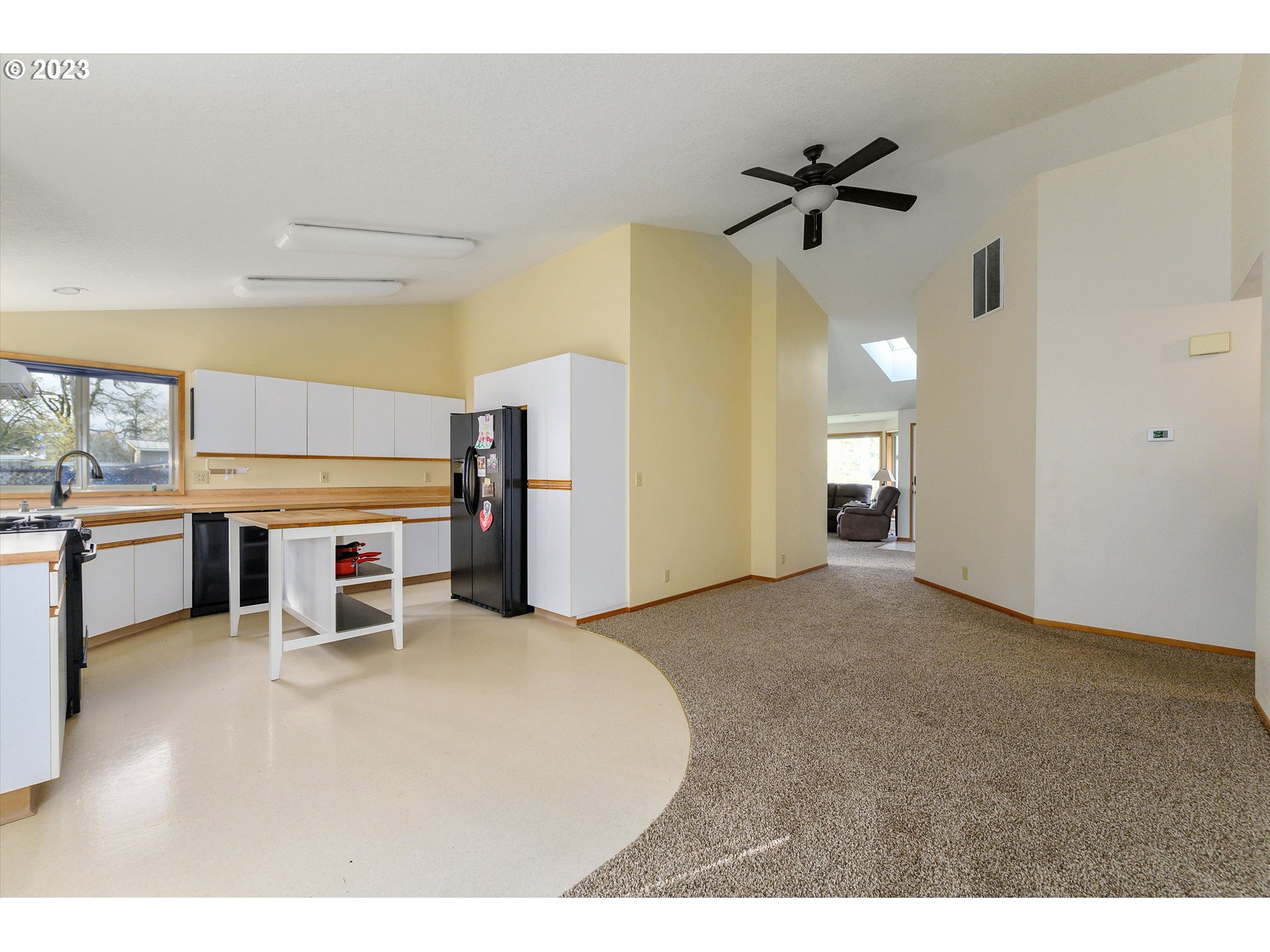 1811 D Street Forest Grove, OR 97116 - Photo 12 of 34 a view of a livingroom with a furniture and a ceiling fan