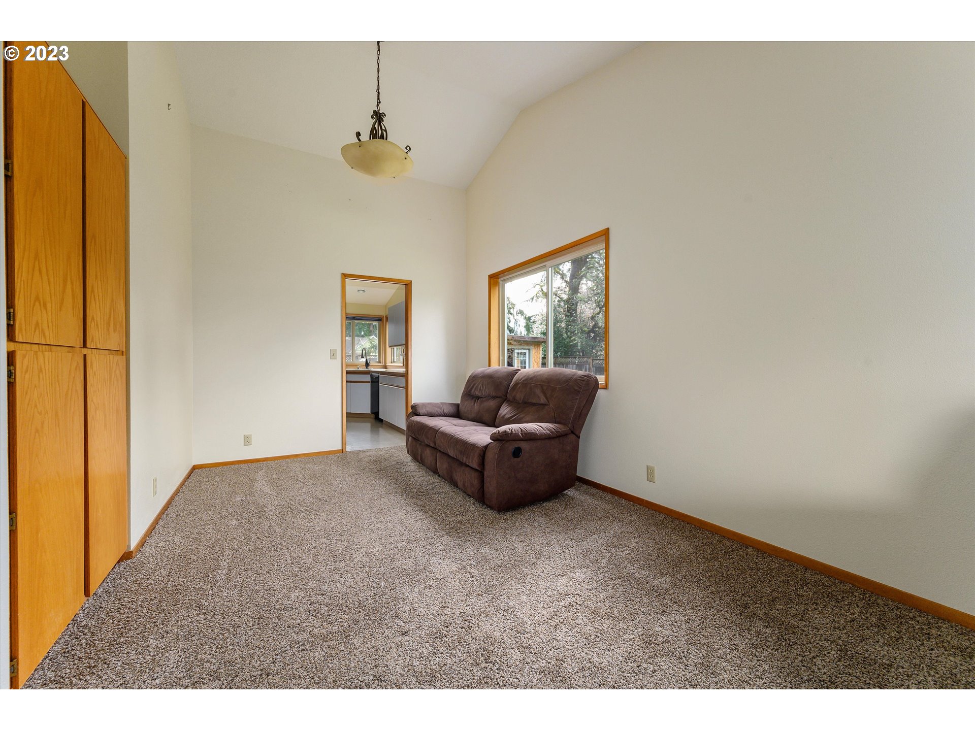 1811 D Street Forest Grove, OR 97116 - Photo 18 of 34 a living room with furniture and a window