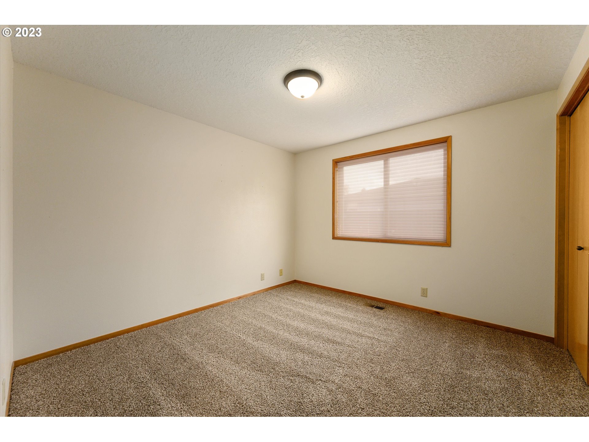 1811 D Street Forest Grove, OR 97116 - Photo 27 of 34 a view of an empty room with a window