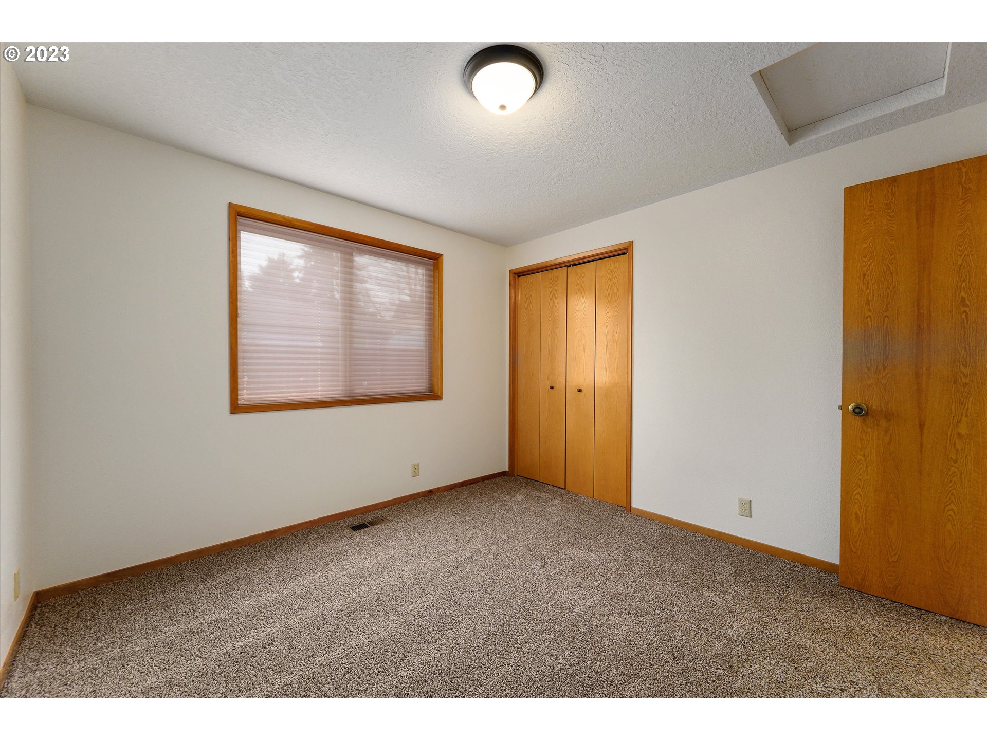 1811 D Street Forest Grove, OR 97116 - Photo 28 of 34 a view of an empty room with a window