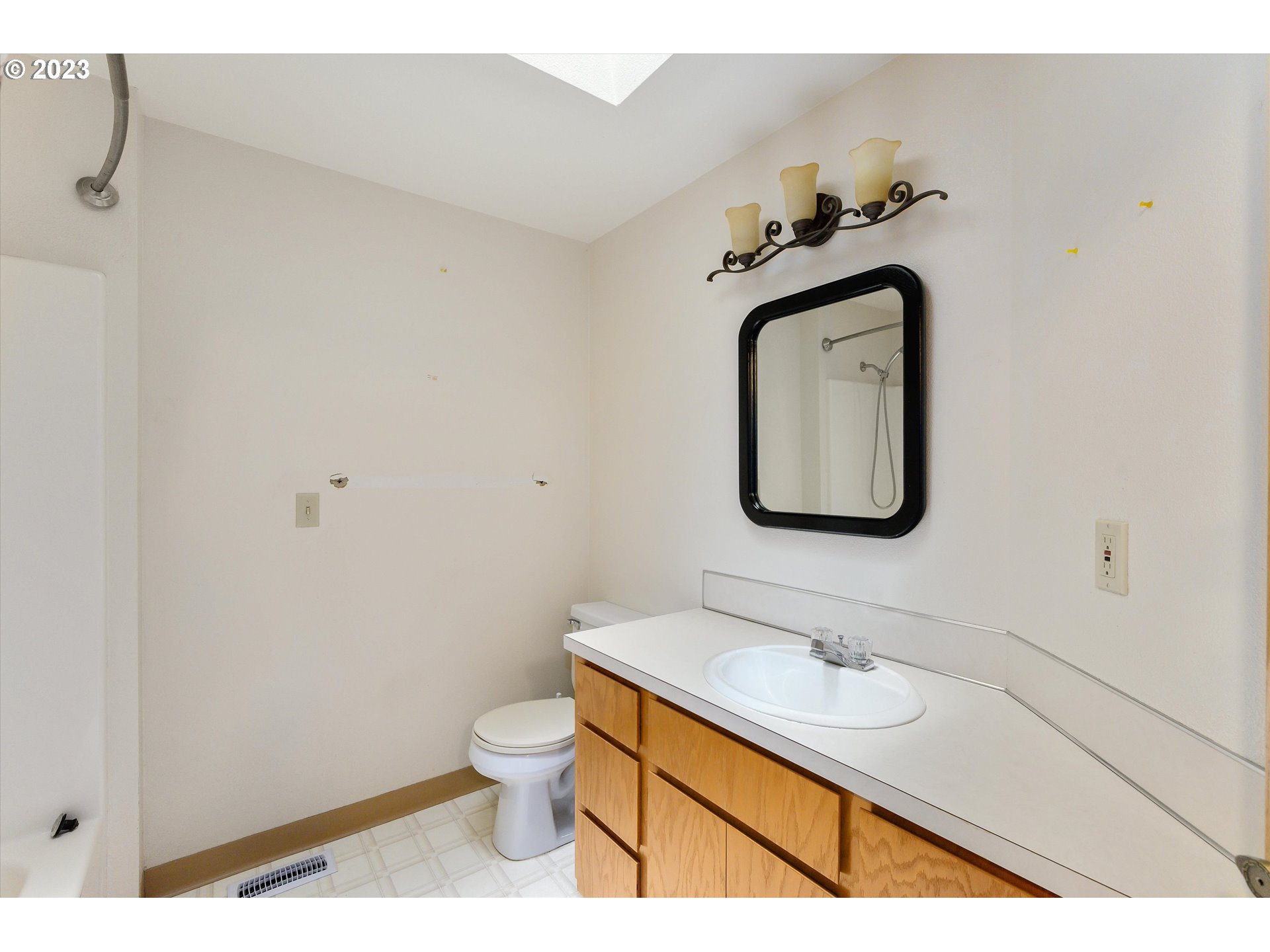 1811 D Street Forest Grove, OR 97116 - Photo 29 of 34 a bathroom with a sink toilet and mirror