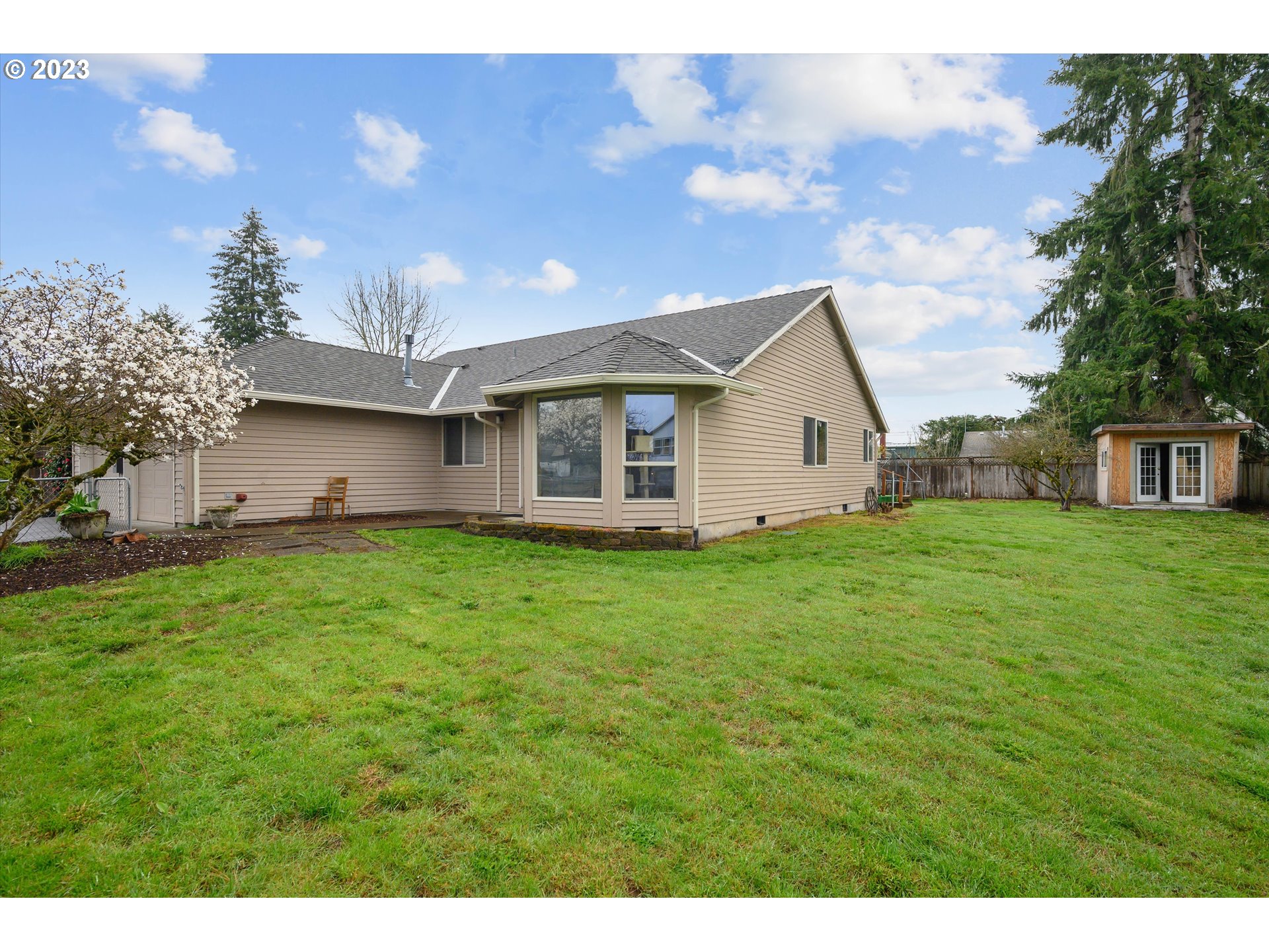 1811 D Street Forest Grove, OR 97116 - Photo 3 of 34 a view of an house with backyard space and garden