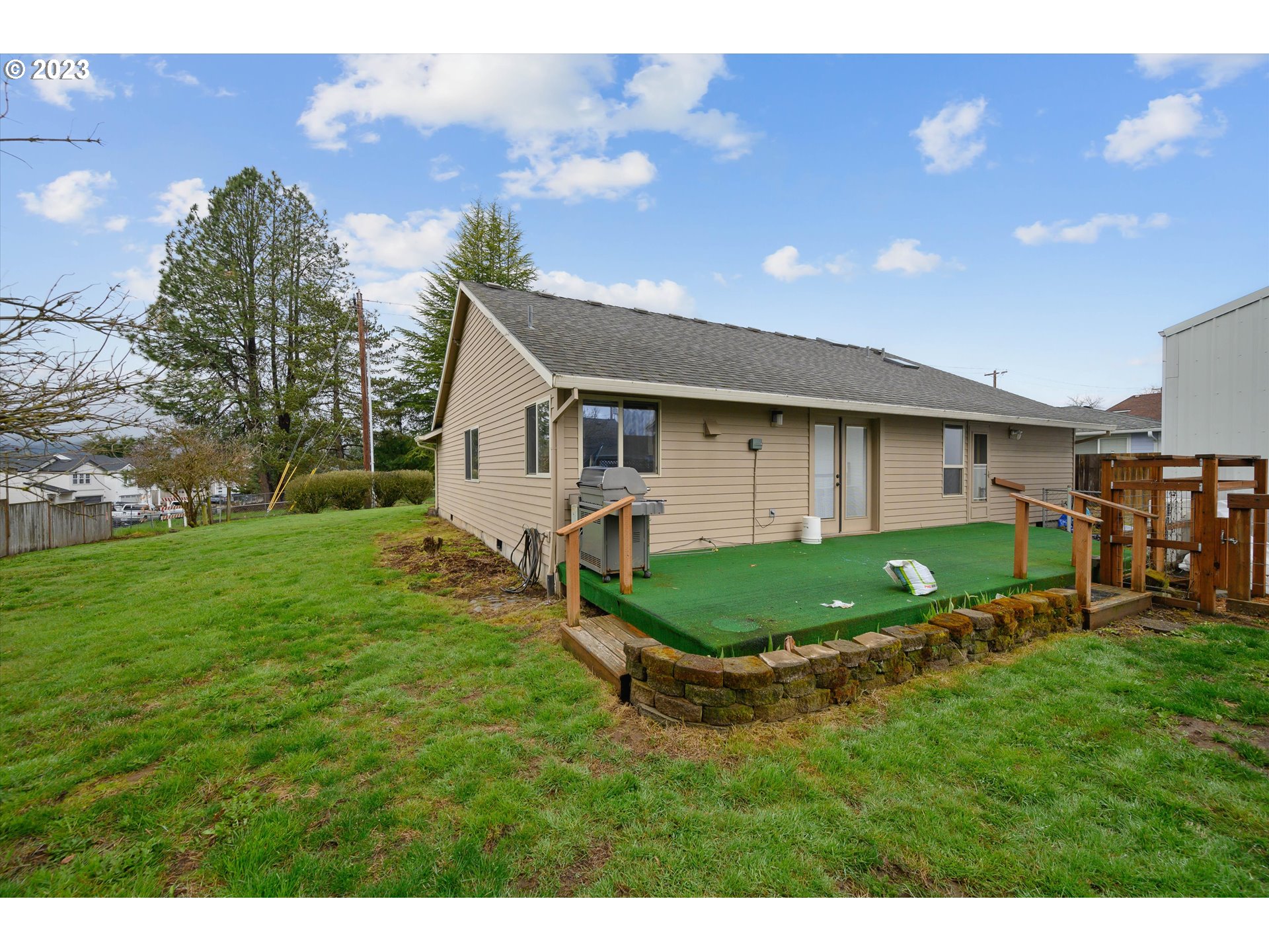 1811 D Street Forest Grove, OR 97116 - Photo 34 of 34 a aerial view of a house with a yard porch and sitting area