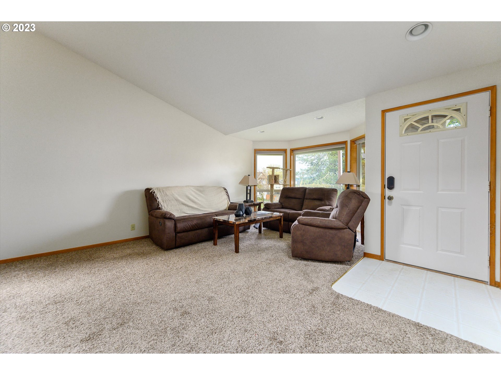 1811 D Street Forest Grove, OR 97116 - Photo 6 of 34 a living room with furniture and a window