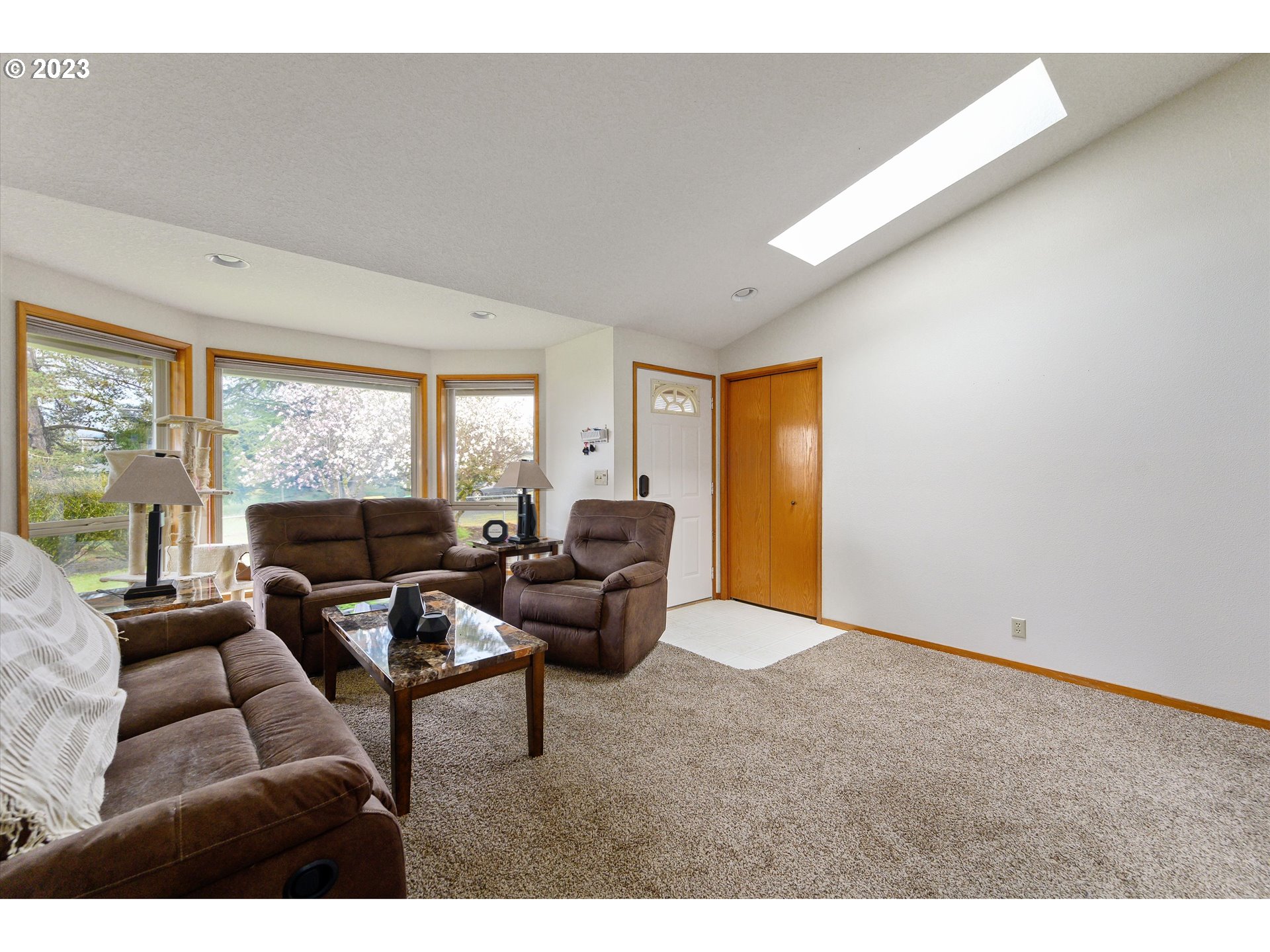 1811 D Street Forest Grove, OR 97116 - Photo 7 of 34 a living room with furniture and a large window
