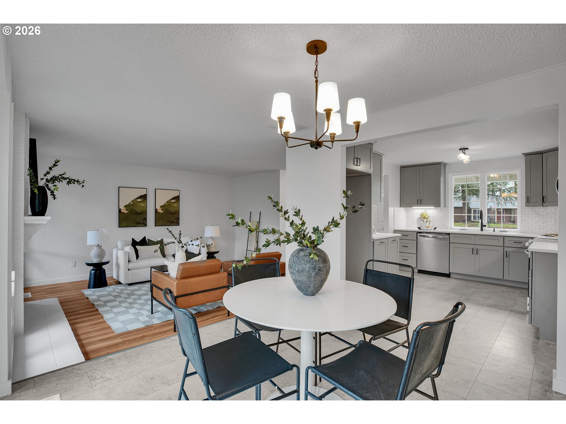20332 Southwest Rock Court Beaverton, OR 97003 - Photo 12 of 47 a view of a dining room with furniture and wooden floor