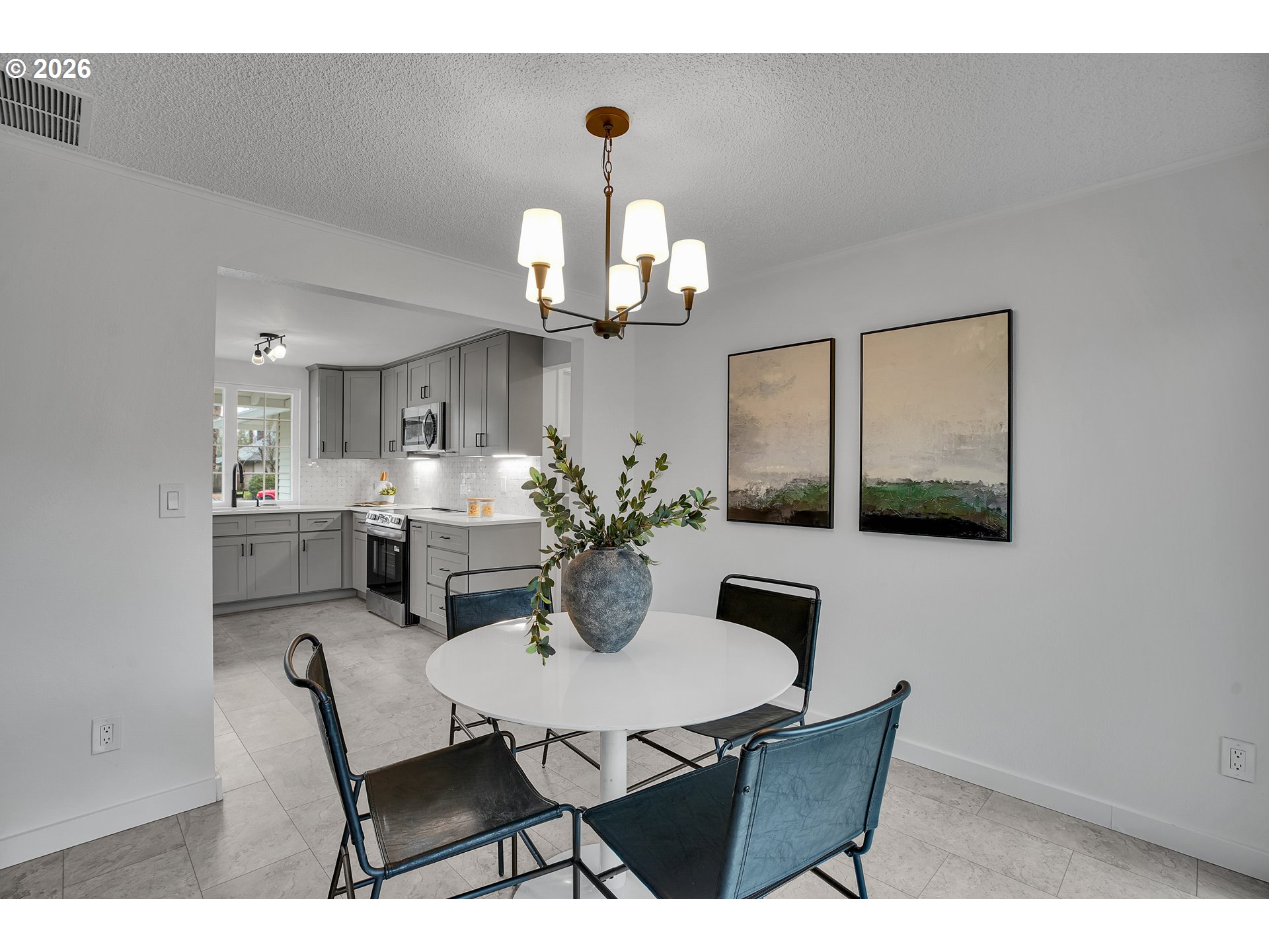 20332 Southwest Rock Court Beaverton, OR 97003 - Photo 14 of 47 a dining room with furniture and chandelier