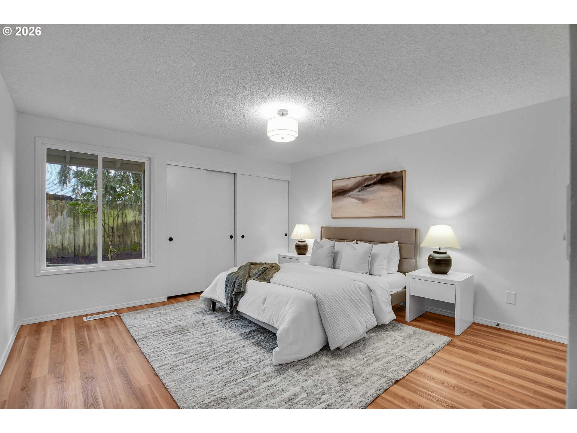 20332 Southwest Rock Court Beaverton, OR 97003 - Photo 29 of 47 a bedroom with a bed and a night stand