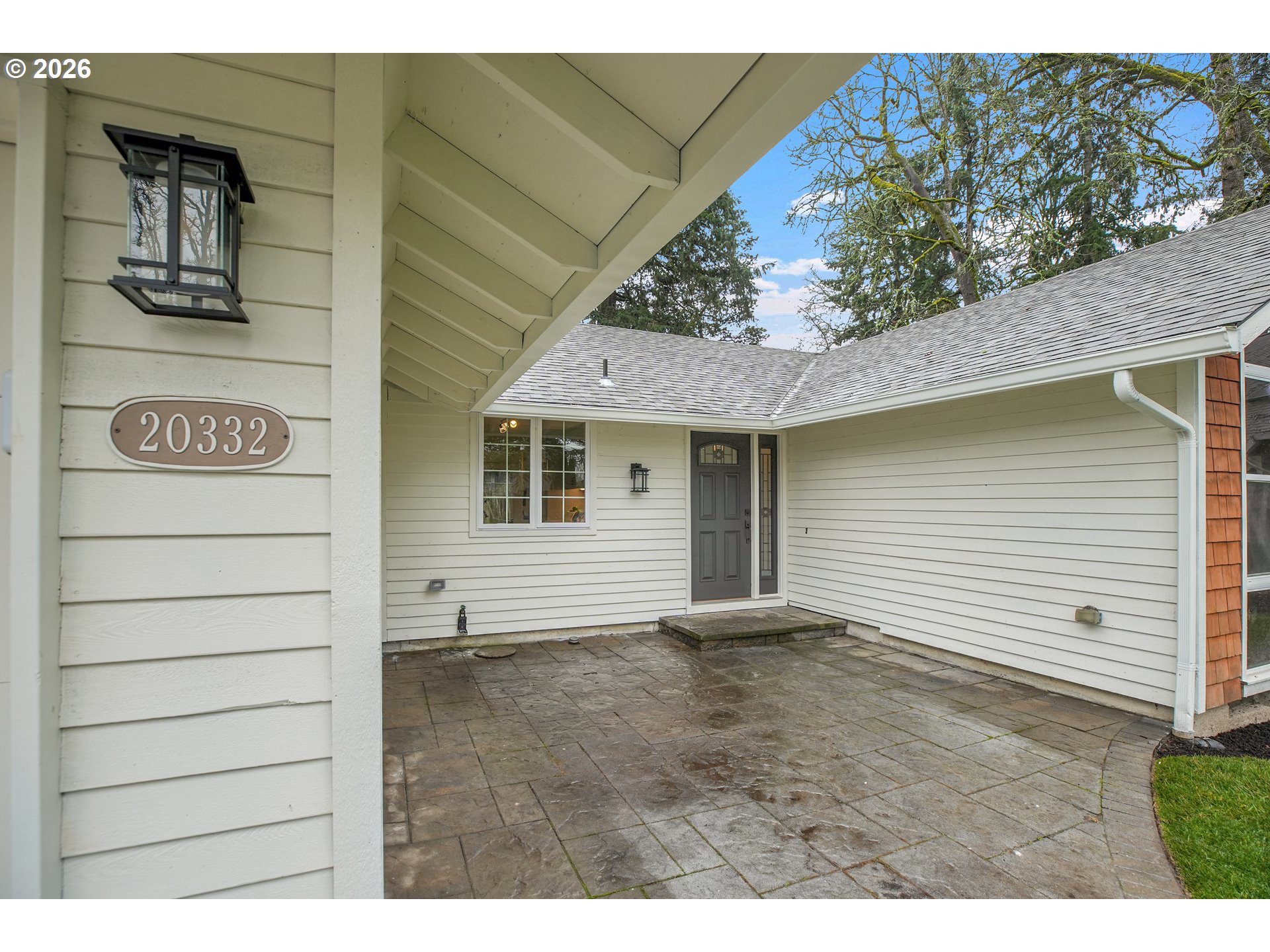 20332 Southwest Rock Court Beaverton, OR 97003 - Photo 3 of 47 a view of a house with a garage