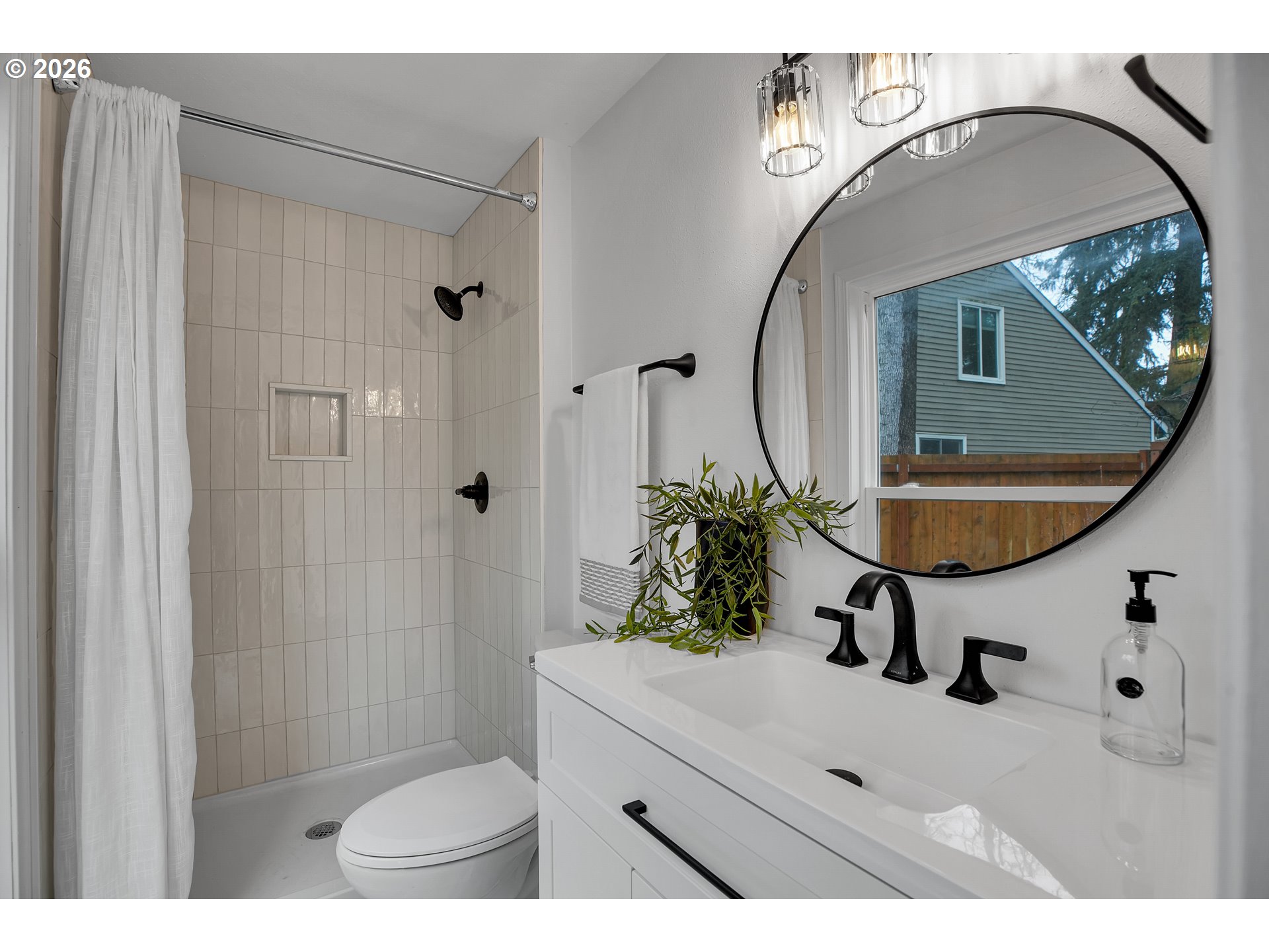 20332 Southwest Rock Court Beaverton, OR 97003 - Photo 32 of 47 a bathroom with a sink mirror toilet and vanity