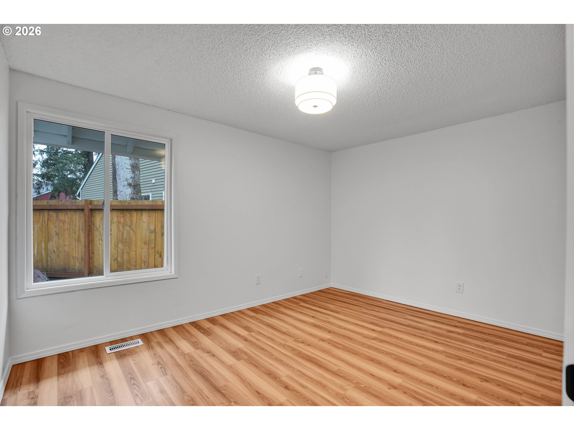 20332 Southwest Rock Court Beaverton, OR 97003 - Photo 36 of 47 a view of an empty room and window